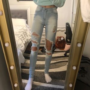 High rise light wash distressed jeans
